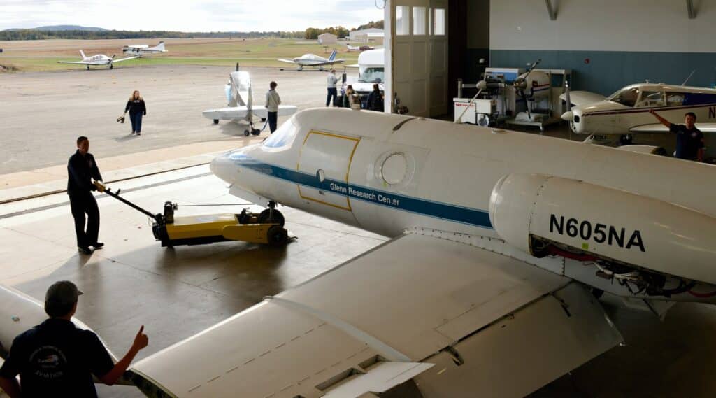 Aviation tech center students working on plane