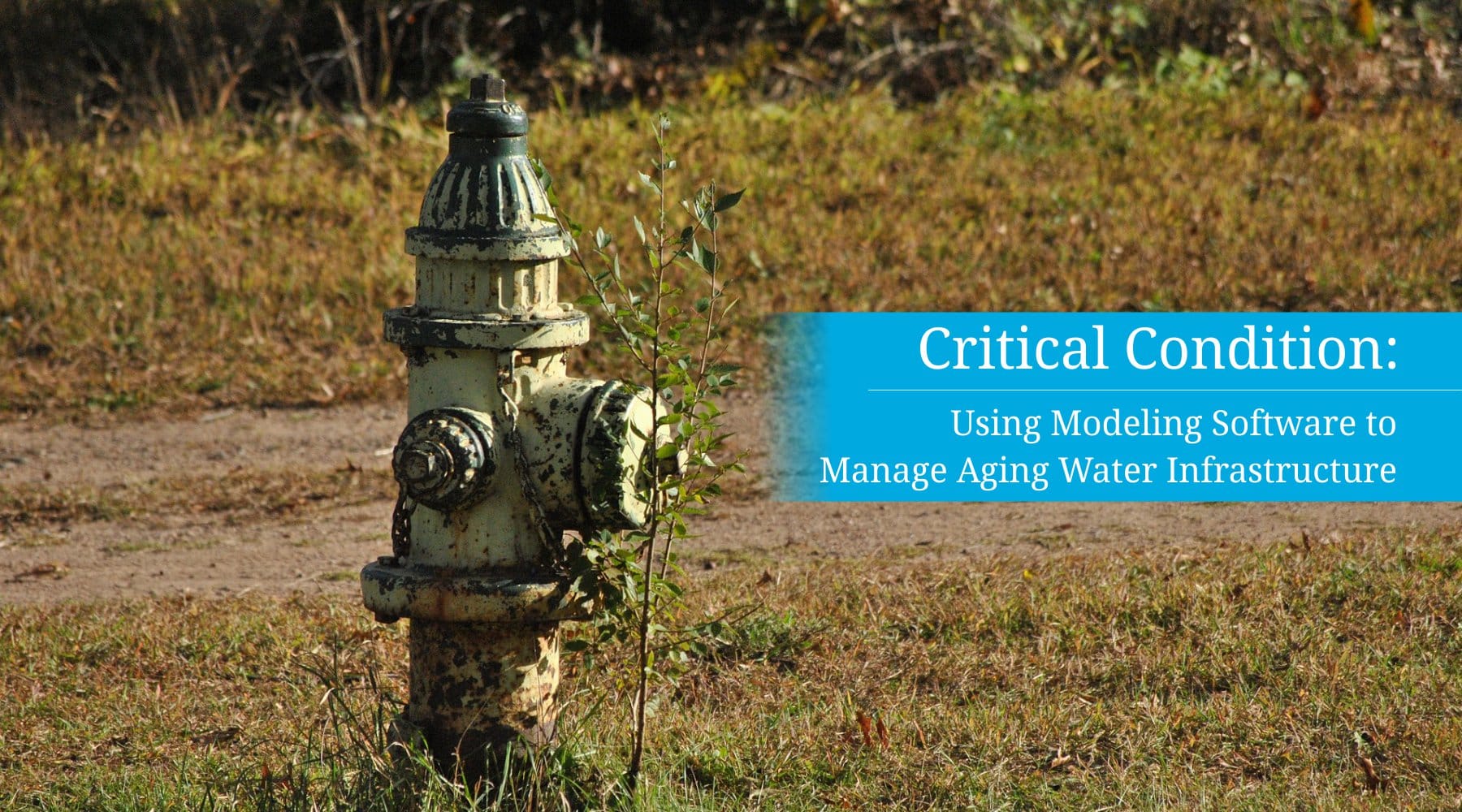 A featured image of an aging fire hydrant surrounded by a field with text on top repeating the title of blog about using modeling software to manage aging water infrastructure.