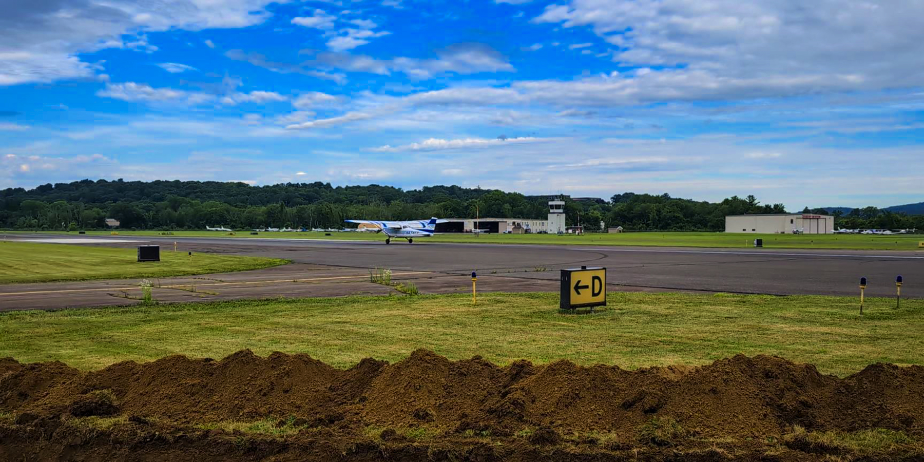 Danbury airport: photo of a plane that has just landed on the runway.