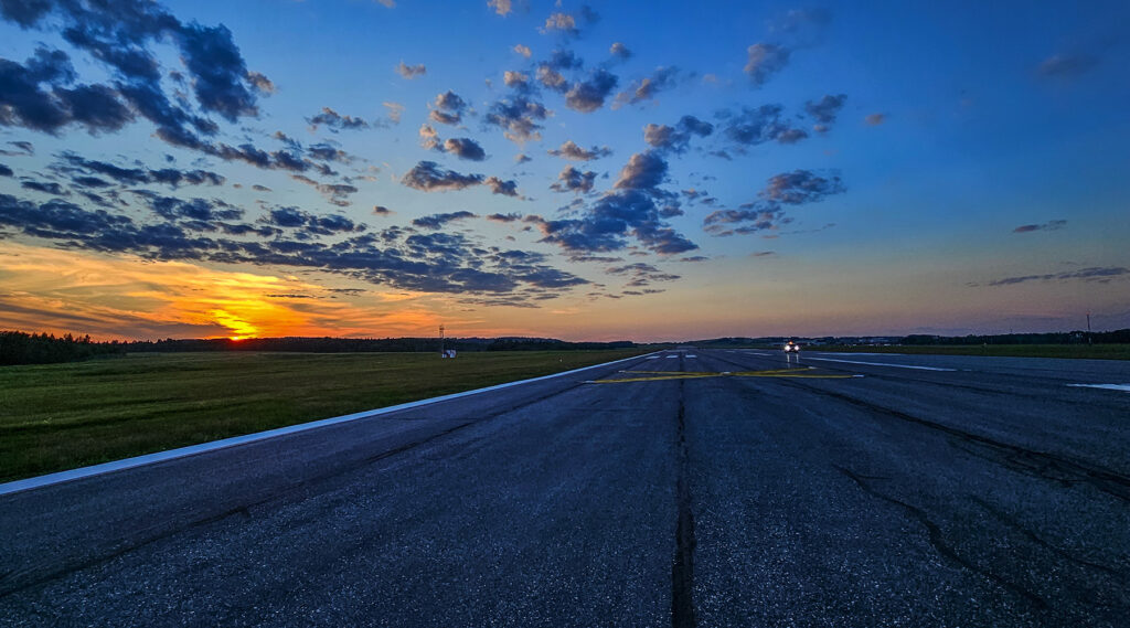 A runway at sunset.