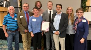 Our incredible team accepting the Merit Award at the 2025 ACEC VT Engineering Excellence Awards Gala.