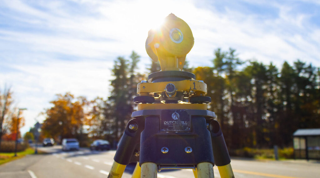 Survey equipment in fall. The sun is shining and the equipment is close-up.
