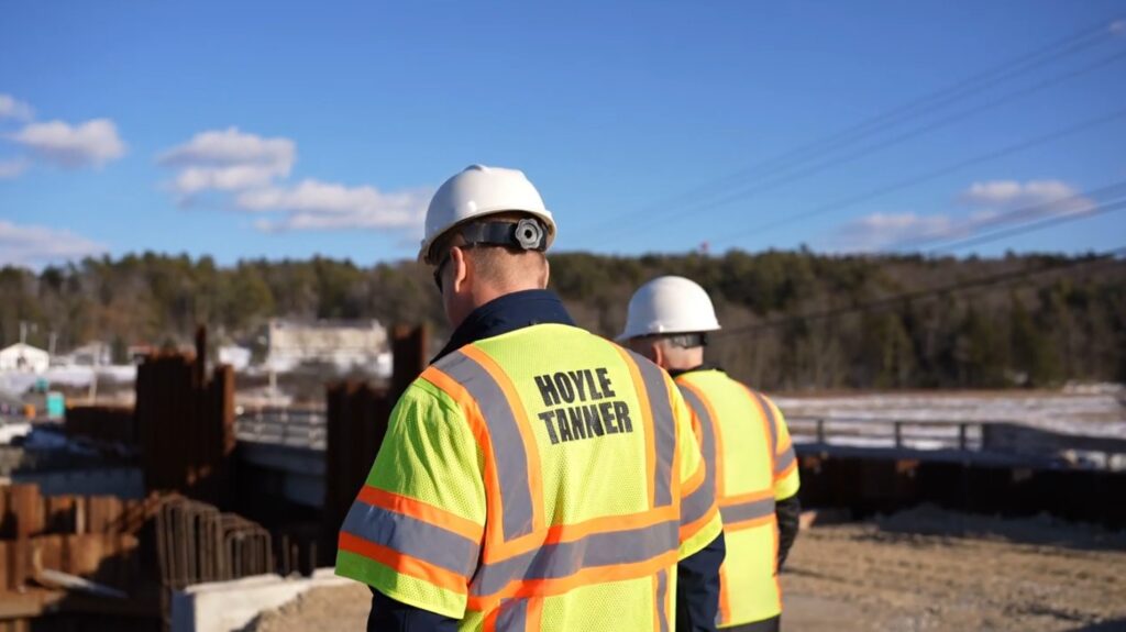 Our team wearing Hoyle Tanner vests out on site.