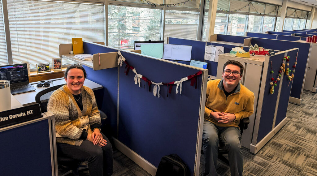 Caroline Corwin and Stephen Hansen at new desks in the Chelmsford office.