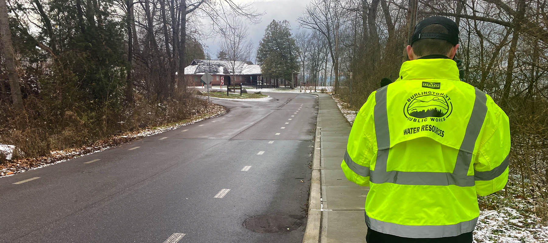 A photo showing a city employee walking along the site, demonstrating the importance of coordination.