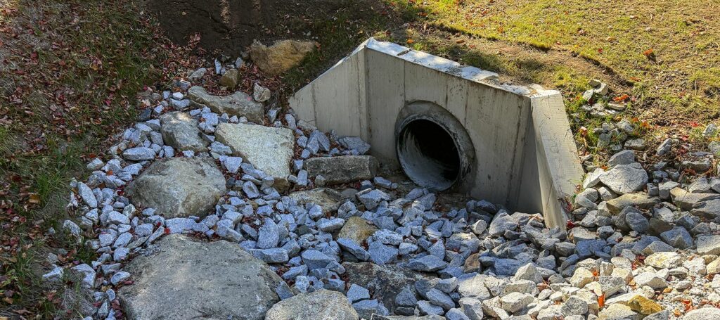 Replaced Corrugated metal piping with HPDE pipe and installed concrete headwalls on culverts for longevity. Riprap installed at inlets and outlets.