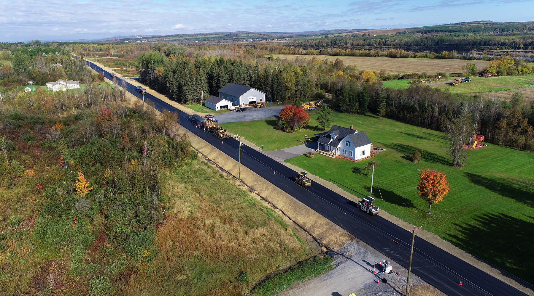Aerial image of Van Buren with newly paved road in autumn.