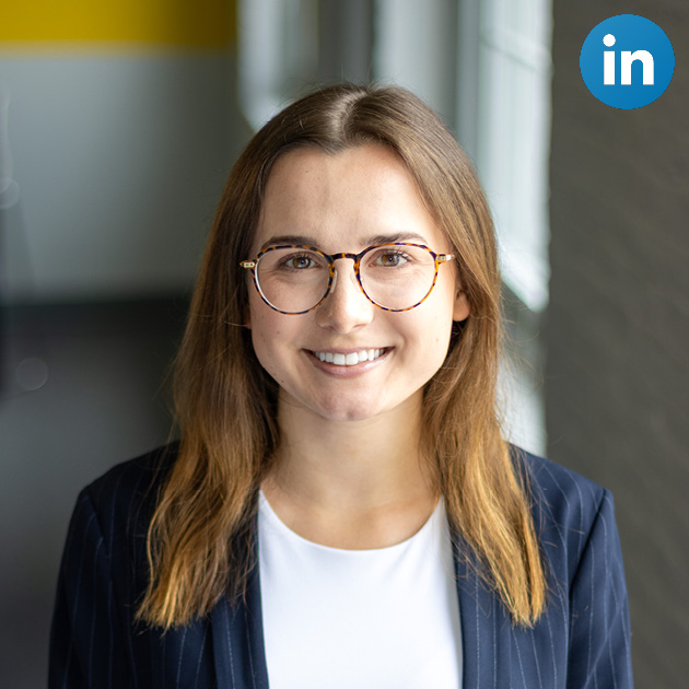Amy Chase Headshot with LinkedIn Icon on corner