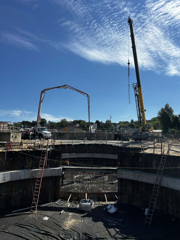 crane operating at a construction site at a wastewater treatment facility plant